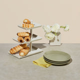 Elite Sweets cream horn dessert pastries on a three tier tray